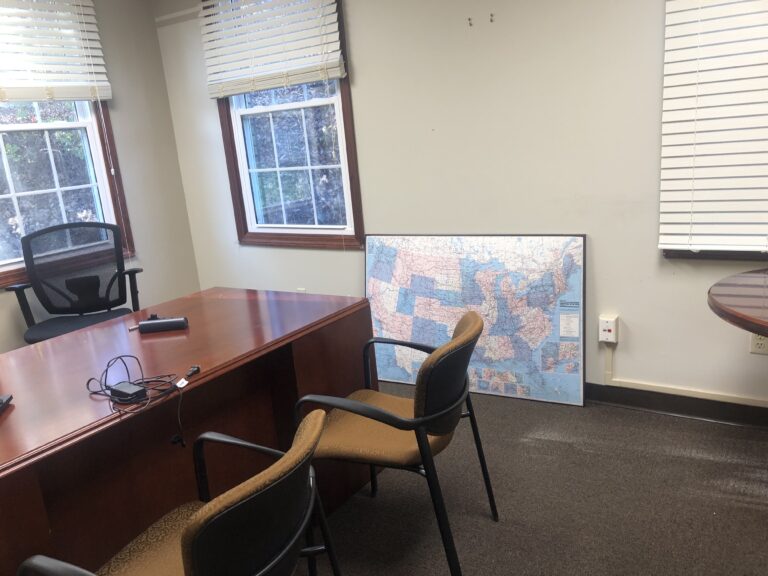 Private office with desk and windows at Nuvork in Rocky Hill, CT